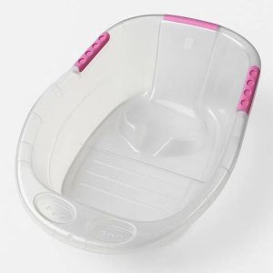 Clear, ergonomic 30-inch large baby bath tub for growing toddlers featuring pink non-slip handles, a built-in safety seat, and a spacious basin for comfortable infant bathing.