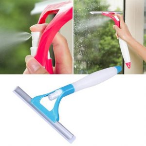 The 3-in-1 Wonder Spray Window Squeegee with Glass Cleaning Wiper Blade features a built-in spray nozzle, a white handle, and a flexible rubber wiping blade, shown both as a blue product display and in action spraying mist onto a glass window.